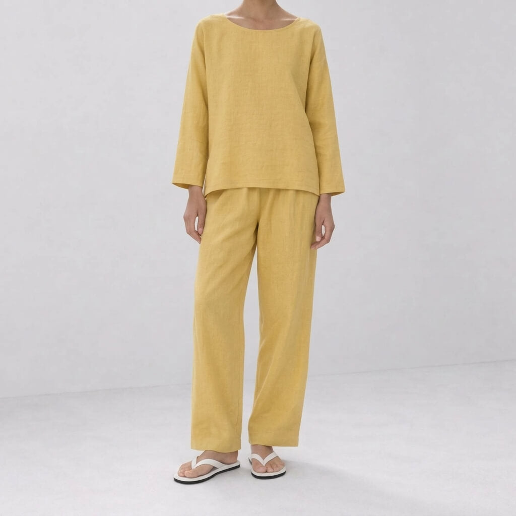 Woman wearing the Lemon hemp long-sleeve top and full-length pants set